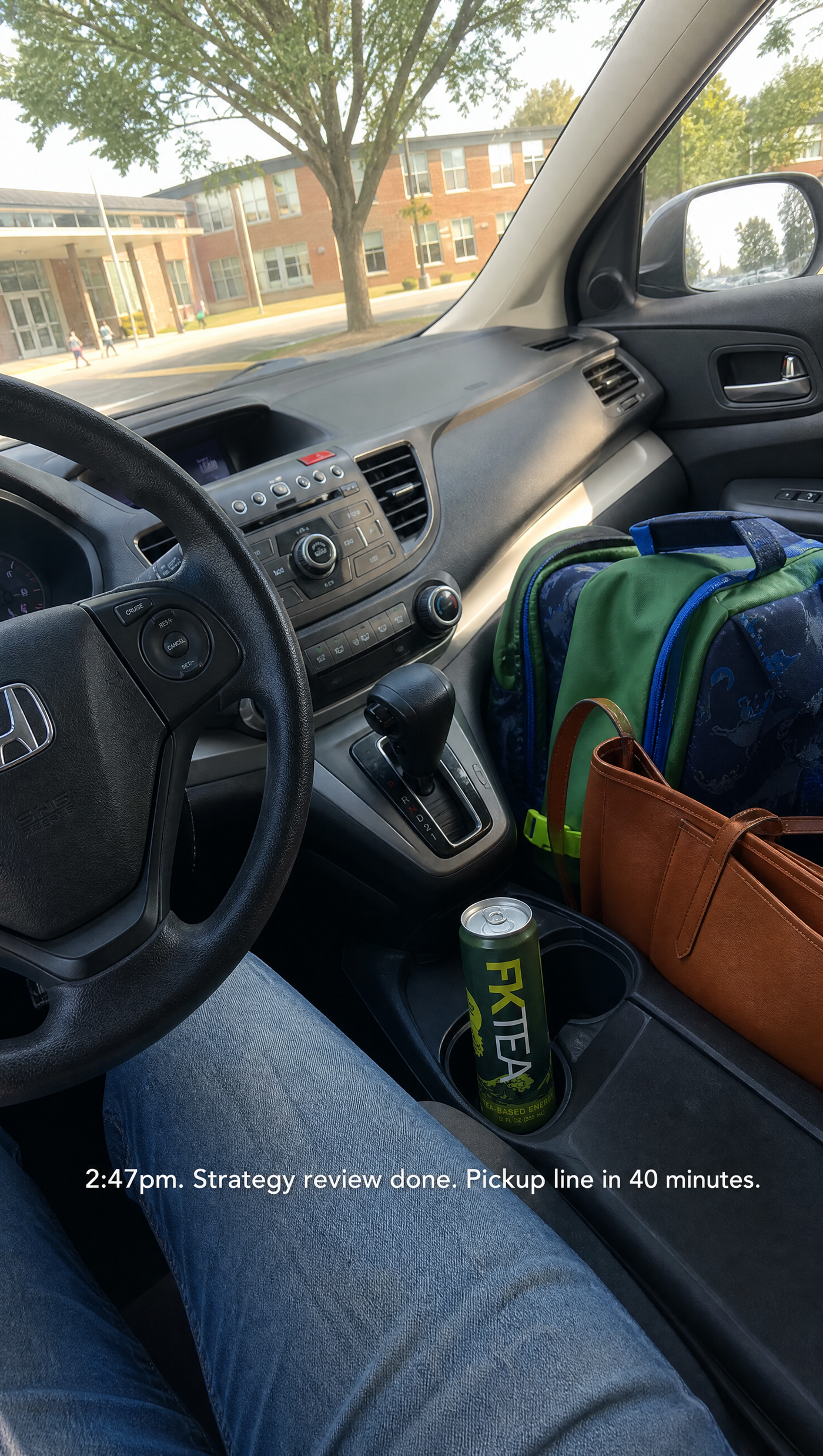 FKTea in a car cup holder between a strategy review and school pickup.