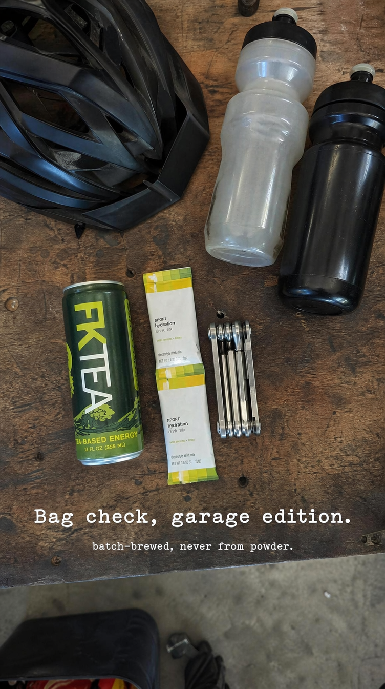 FKTea with cycling gear in a garage bag check.